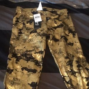 Gold and black leggings brand new